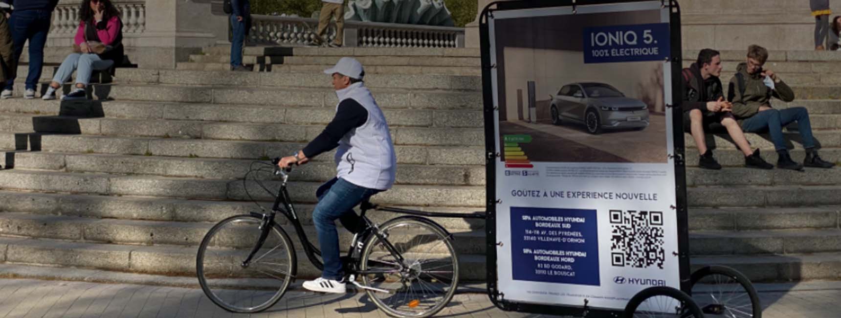 Opération affichage mobile avec le Bike'Com pour ioniq 5 - Keemia Bordeaux agence marketing locale en région Aquitaine